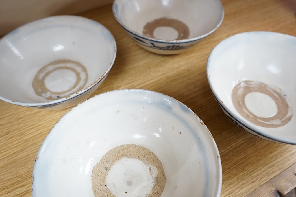 A set of four swatow blue and white pottery bowls, 17cm diameter. Condition - fair